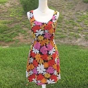 We love Vera floral tank dress